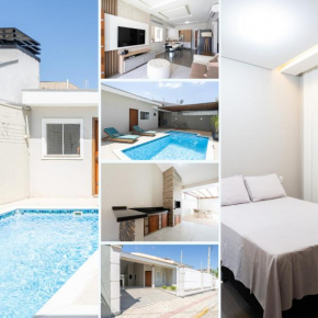 CASA em Bal Picarras 400m PRAIA, 1 suíte, 2 quartos, PISCINA, CHURRASQUEIRA 2 vagas privativas de garagem, TODOS os quartos e sala de estar CLIMATIZADOS, cozinha completa, acomoda até 8 pessoas